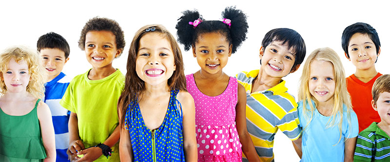 A diverse group of children posing together with cheerful expressions.